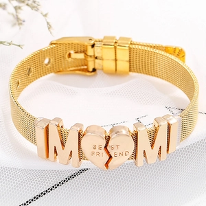 Golden mesh bracelet with sliding letter M charms and engraved Best Friend heart pendant