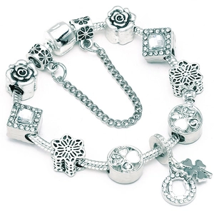 Detail of silver beaded bracelet with rose charms, four-leaf clover, and safety chain