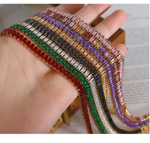 Macro detail of colorful rectangular cut gemstone tennis necklaces and bracelets set