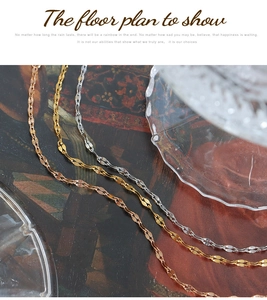 Detailed close-up of delicate twisted wave chains in rose gold, gold, and silver finishes