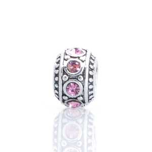 Pandora style silver-tone cylinder bead with pink crystals and beaded edge detailing