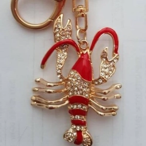 Porte-clés homard en cristal scintillant avec émail rouge et base en métal doré
