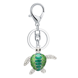 Silver turtle keychain with green enamel shell and sparkling white rhinestones