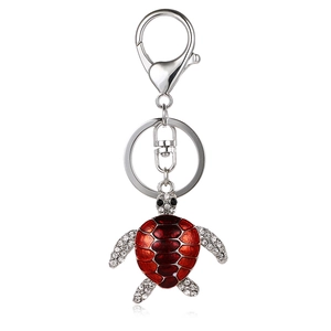 Sparkling rhinestone sea turtle keychain with red enamel shell and silver keyring