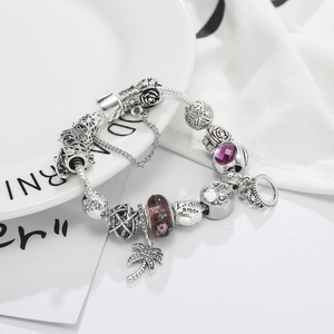 Elegante bracciale in argento S925 con perline viola e ciondolo a forma di palma