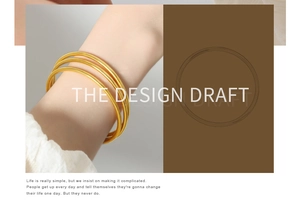 Close-up of three minimalist polished gold stacking rings for women in titanium steel