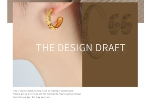 Detail of gold moon and sun relief earrings with sparkling zircon on model side view