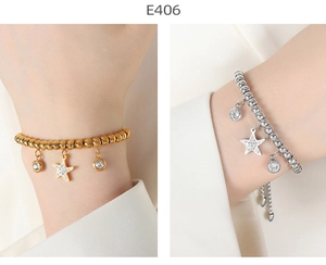 Close-up of hip-hop titanium steel bracelet with star pendants and adjustable chain