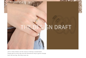 Detail of gold titanium ring with oval blue gemstone next to its original design draft