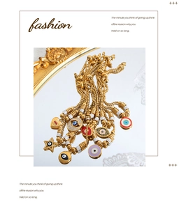 Detail of 18K gold plated evil eye bracelets with colorful enamel and zircon charms