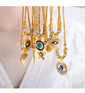 Detailed close-up of 18K gold-plated Evil Eye bracelets with colorful micro-pave crystals