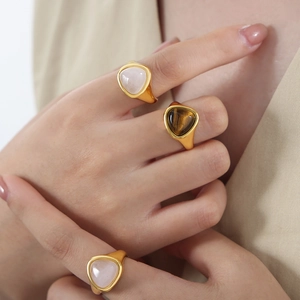 European gold plated stainless steel rings with faceted tiger eye and rose quartz stones