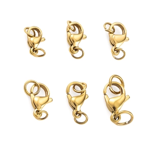 Macro view of six gold-plated lobster clasps for DIY necklace and bracelet jewelry making