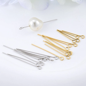 Gold and silver stainless steel eye pins for DIY jewelry making with pearl demonstration