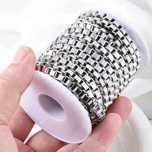 Silver stainless steel box chain roll for DIY jewelry making held by hand