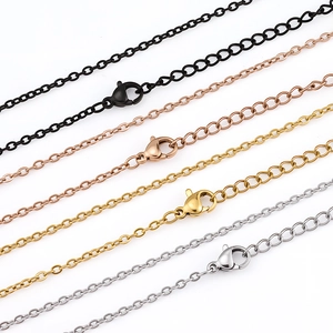 Polished stainless steel cross chain necklaces in black, gold, and silver finishes