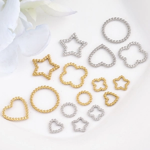 DIY jewelry connectors in heart star and clover shapes made of stainless steel beads