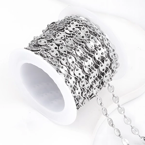 Silver stainless steel coffee bean link chain for DIY jewelry making on white spool