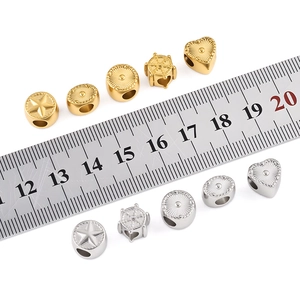 Diverse goud- en zilverkleurige roestvrijstalen kralen voor DIY-sieraden met hart- en sterpatroon