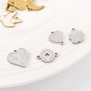 Assorted gold and silver stainless steel heart and flower pendants for DIY jewelry making