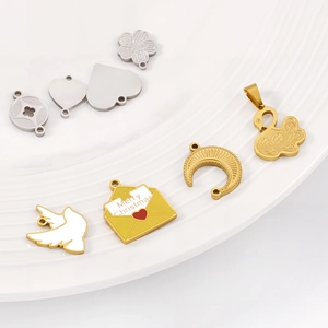 Assorted gold and silver stainless steel DIY pendants with heart and flower motifs