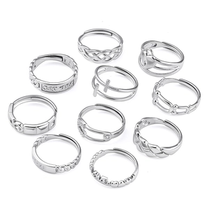 11-piece minimalist silver stackable ring set featuring heart and cross charms