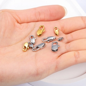 Detail of assorted gold and silver stainless steel lobster clasps in various sizes for DIY