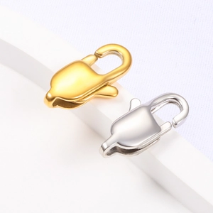 Detail of gold and silver square spring clasps for DIY necklace and bracelet jewelry making
