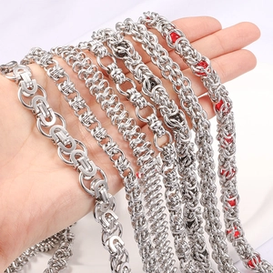 Polished stainless steel chunky chains set with stylish red and black bead accents