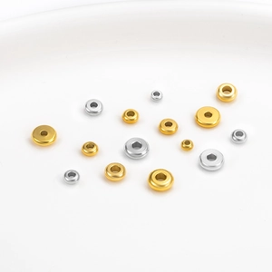 Polished 18K gold and silver spacer beads in various sizes for DIY jewelry crafting