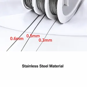 Three sizes of stainless steel beading wire (0.3mm to 0.6mm) on white plastic spools