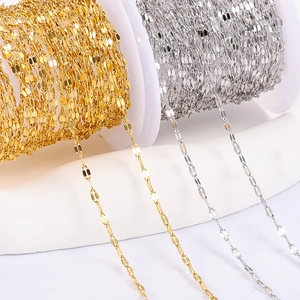 Detailed macro of gold and silver stainless steel bead chains for DIY jewelry making