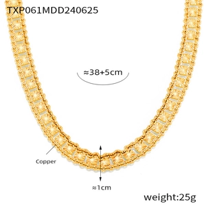 Macro shot of 1cm wide gold plated copper necklace with triple row textured design
