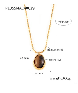 Detailed view of oval tiger's eye pendant with dimensions on gold bamboo chain