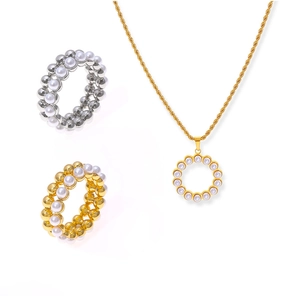 Set gioielli vintage in titanio con collana di perle e anelli in oro e argento