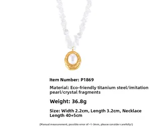 Detail of oval gold titanium necklace with faux pearl and translucent crystal stones