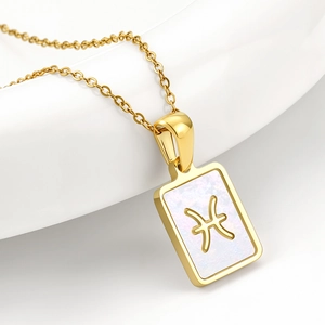 Pisces zodiac necklace with gold plated rectangular pendant and white shell inlay