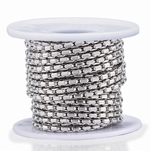Silver stainless steel bead chain on white plastic spool for DIY jewelry making