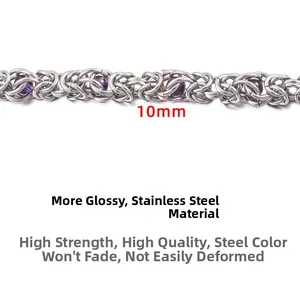 Detailed macro view of 10mm stainless steel Byzantine chain with purple bead insets