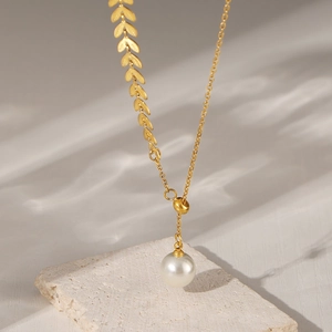 Elegant 18k gold plated wheat leaf necklace with a large round white pearl pendant