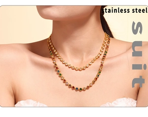 Detail of double-layer stainless steel necklace with colorful zircon bead charms