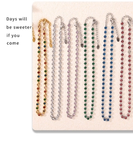 Detail of colorful tennis chain set in 18K gold-plated stainless steel with lobster clasp