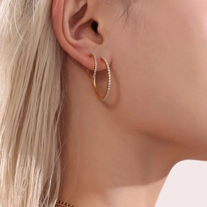 Elegant gold titanium steel hoop earrings with sparkling zircon crystals for women
