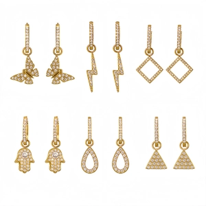 Set of 6 gold plated stainless steel hoop earrings featuring zircon butterfly and lightning charms