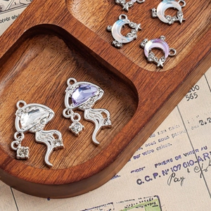 Silver jellyfish and moon charms with zircon inlays for DIY jewelry making