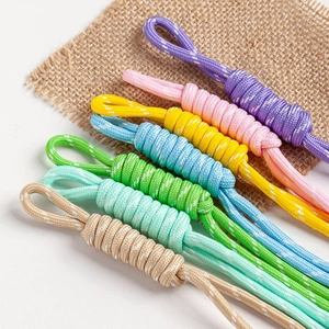 Close-up of colorful braided nylon paracord keychains in vibrant multiple tones