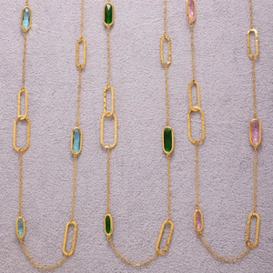 Double-layered 18k gold plated stainless steel necklace with colored faceted glass stones