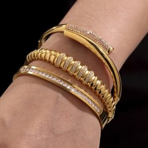 Three-piece stackable 18k gold plated stainless steel bangles with sparkling zircon inlay