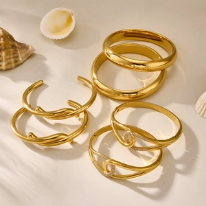 Irregular crossover gold plated bracelets with micro-inlaid zircon and wave design