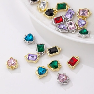 Assorted heart and rectangular gemstone pendants for DIY jewelry in gold and silver frames